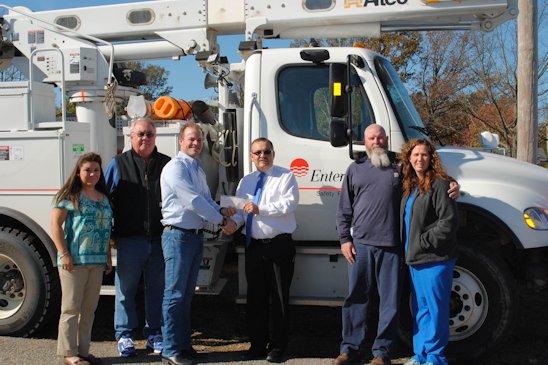 Pictured Left to Right:  Kyli Hamrick, Education Foundation Vice Chair, Phillip Helm, Education Foundation Chair, Rick Riley, Entergy Arkansas VP, Customer Service, Brad Roberts, Superintendent, Bryan Evans, and Lisa Mason, life-long friend) 